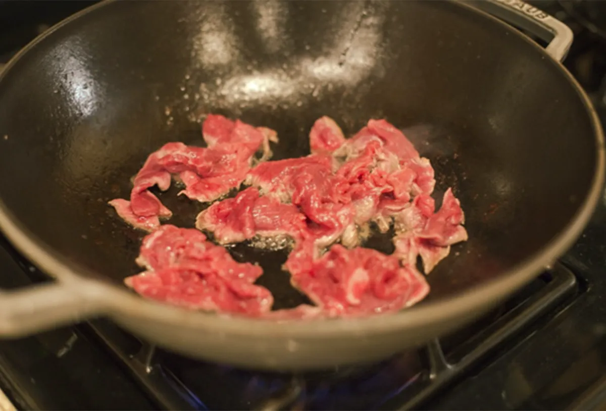 Beef being pan-seared at Nabe-En